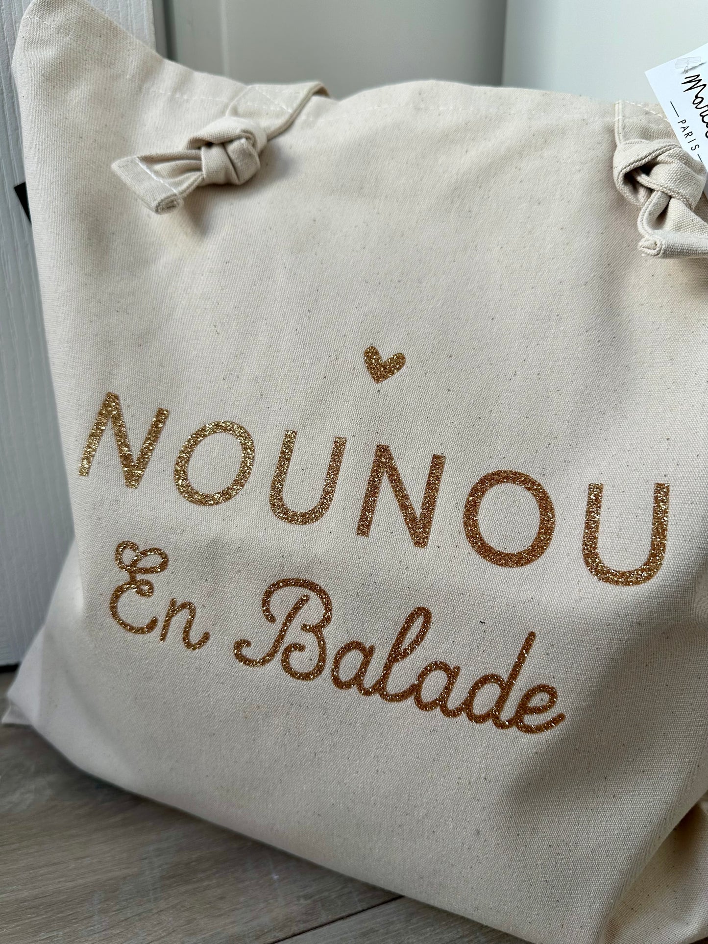 Tote bag à noeuds écru "Nounou en balade"