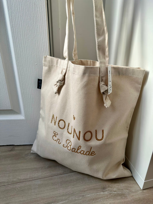 Tote bag à noeuds écru "Nounou en balade"